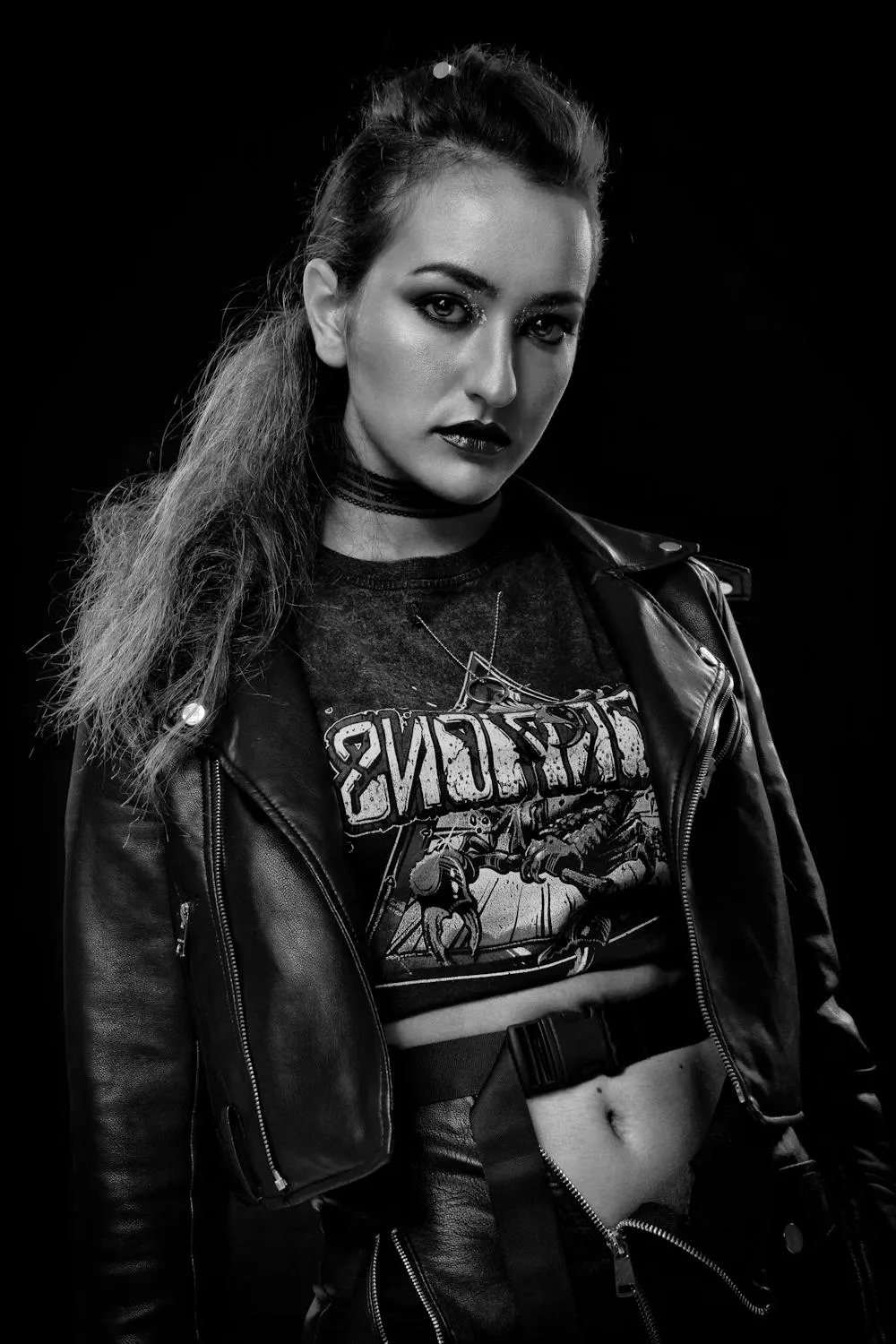 Woman in a Leather Jacket Giving a Fierce Urban Attitude
