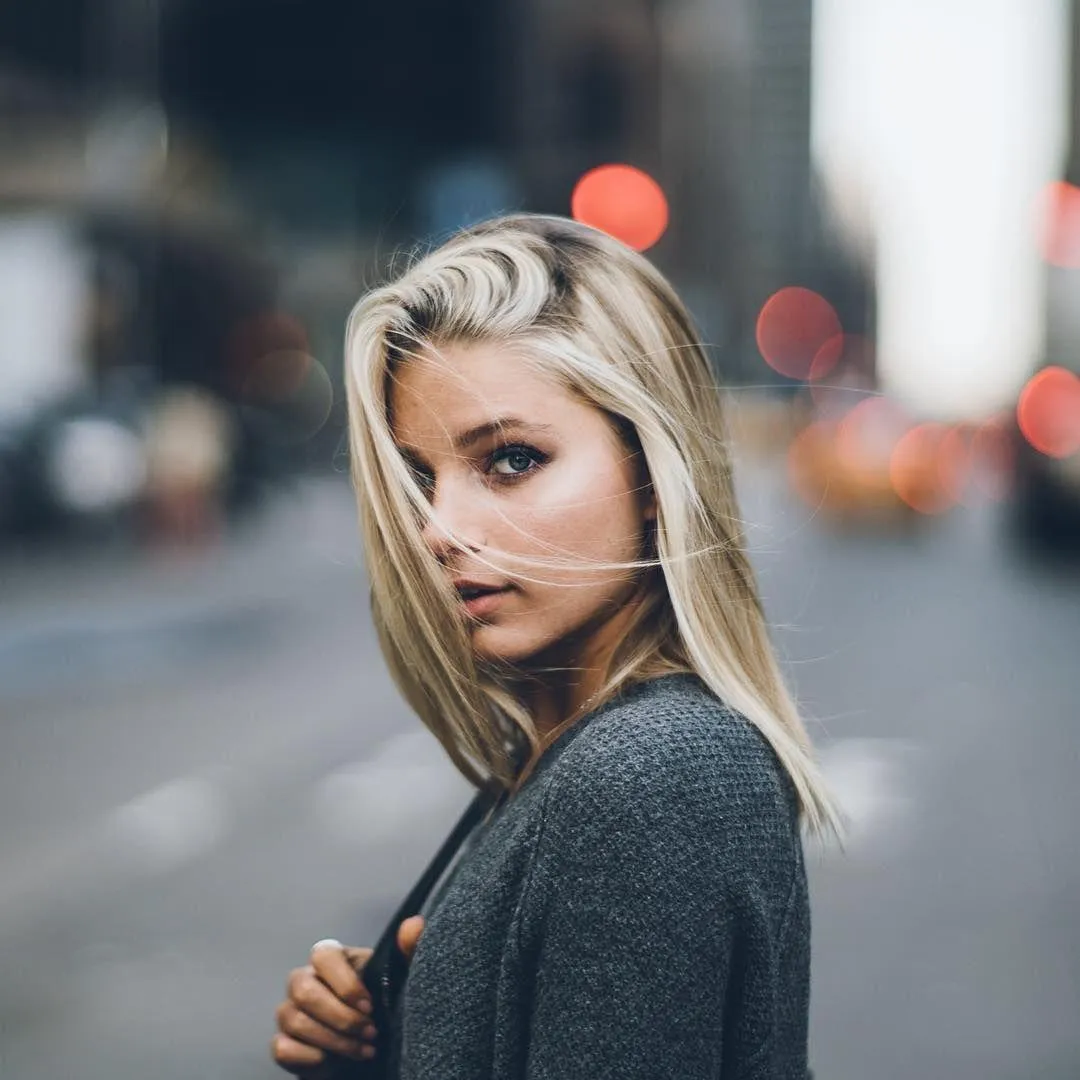 Woman Posing with an Autumn Leaves Wrapped Around Her Image