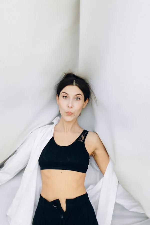 Woman Posing Between White Fabric in Black Top Hd Wallpaper