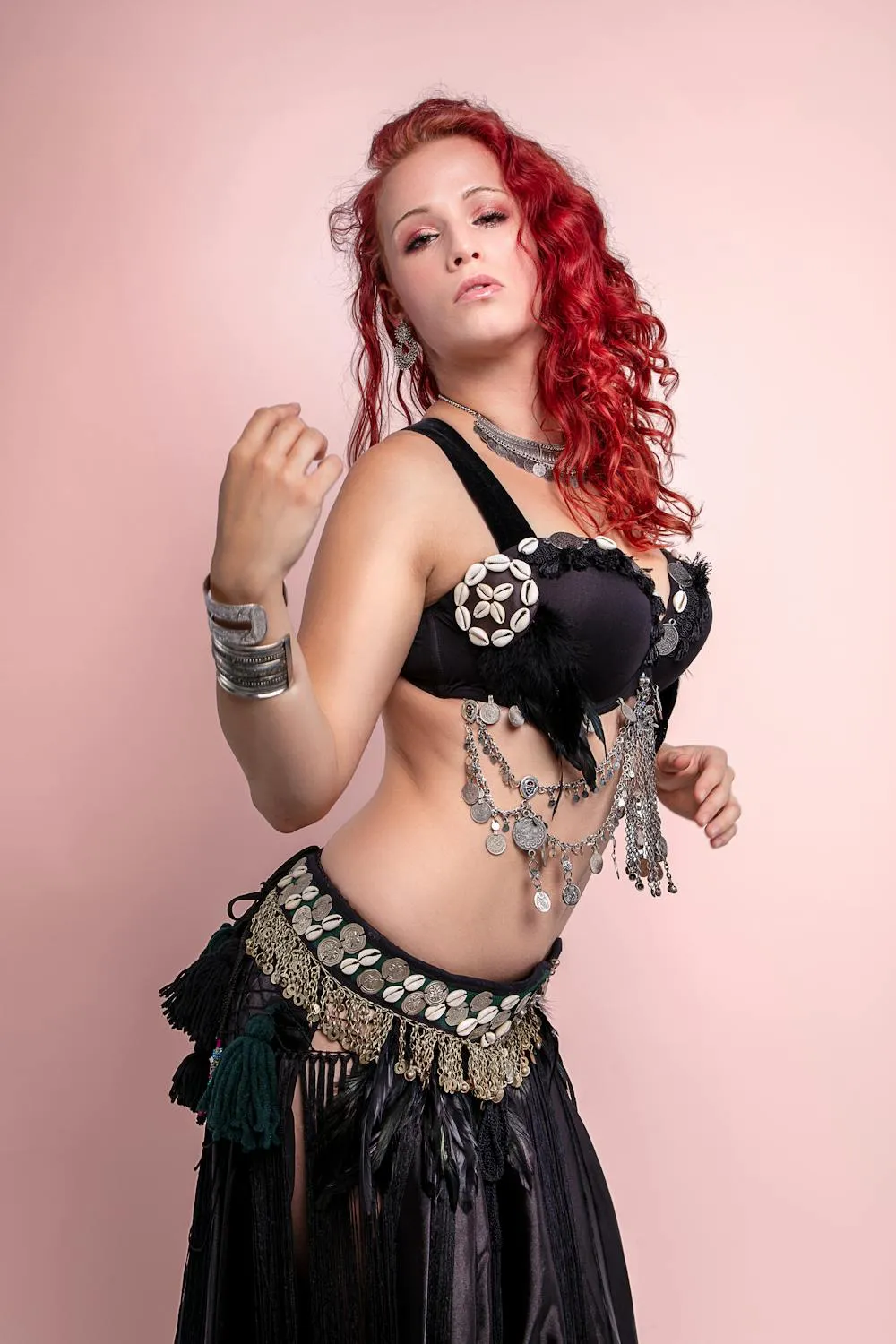 Woman with Red Hair Wearing a Tribal Belly Dance Costume