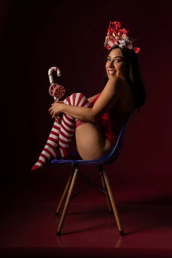 Woman in Red Socks Sitting on a Chair with Striped Decor
