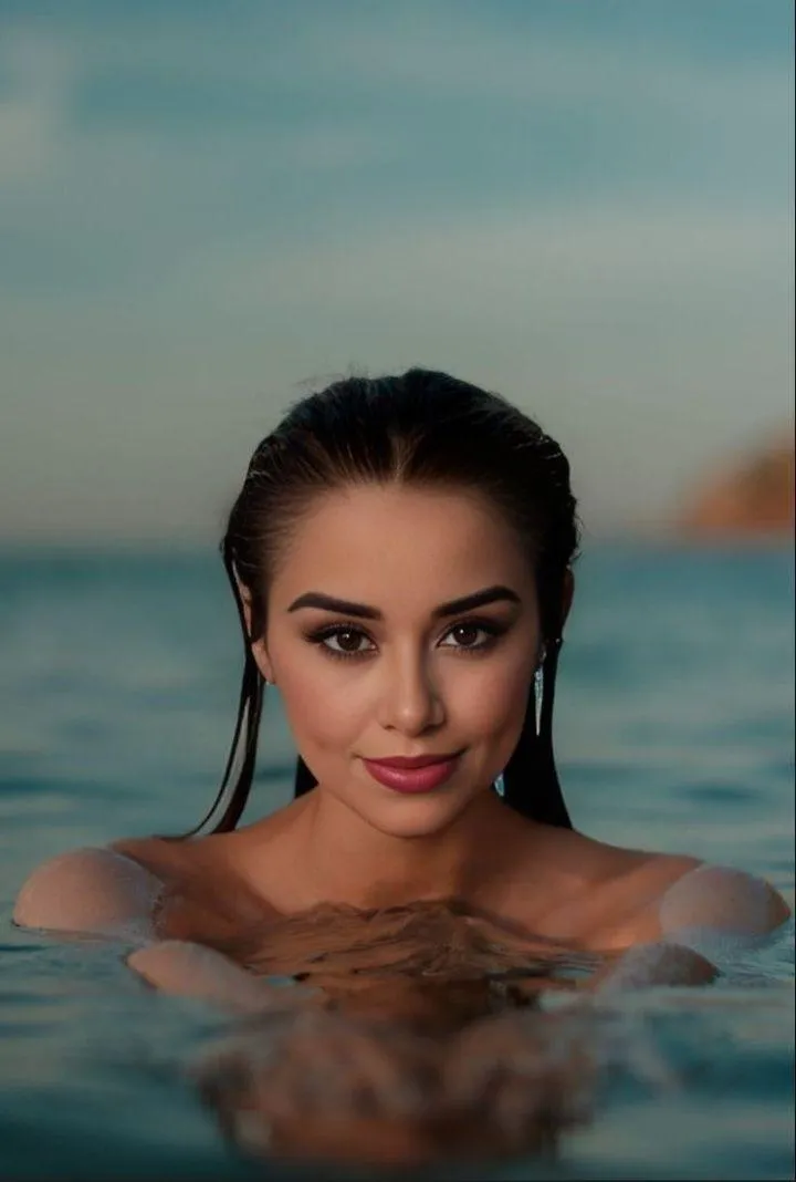 Woman Relaxing in Water with Her Shoulders Above the Surface