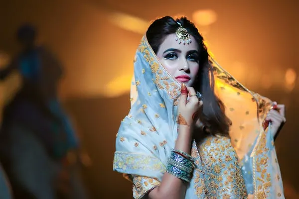 Woman in Traditional Dress with Artistic Dramatic Lighting