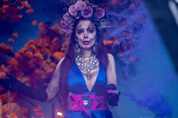 Woman Wearing a Floral Crown Poses in Colorful Lighting