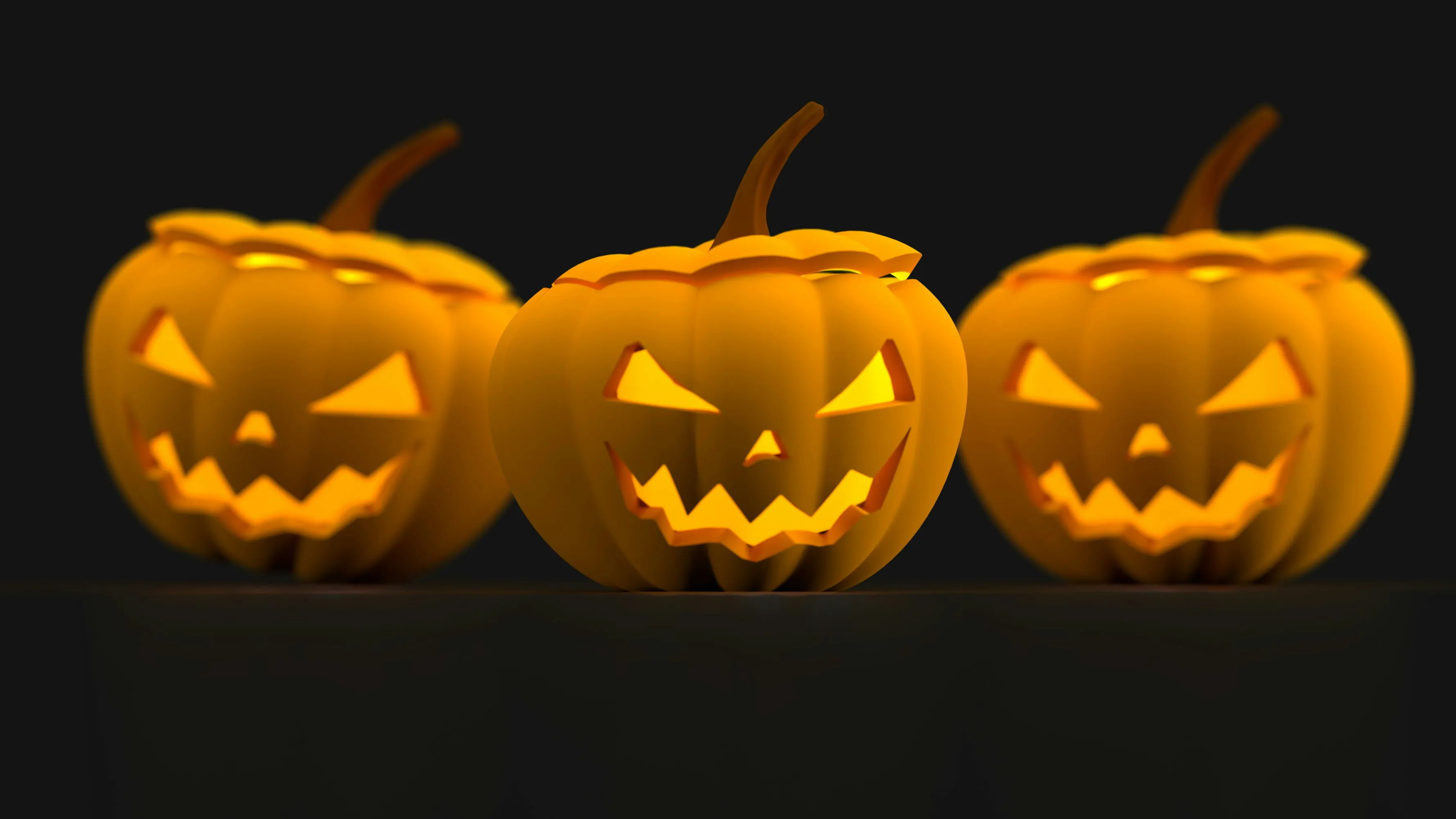 3D Glowing Jack O Lanterns on Dark Background Wallpaper