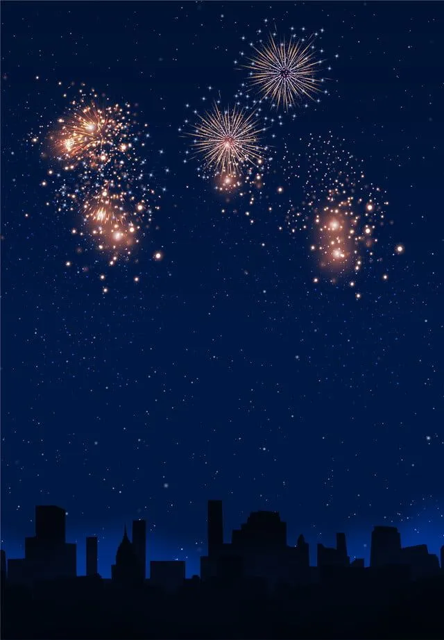 Aerial View of Fireworks over a Cityscape at Night