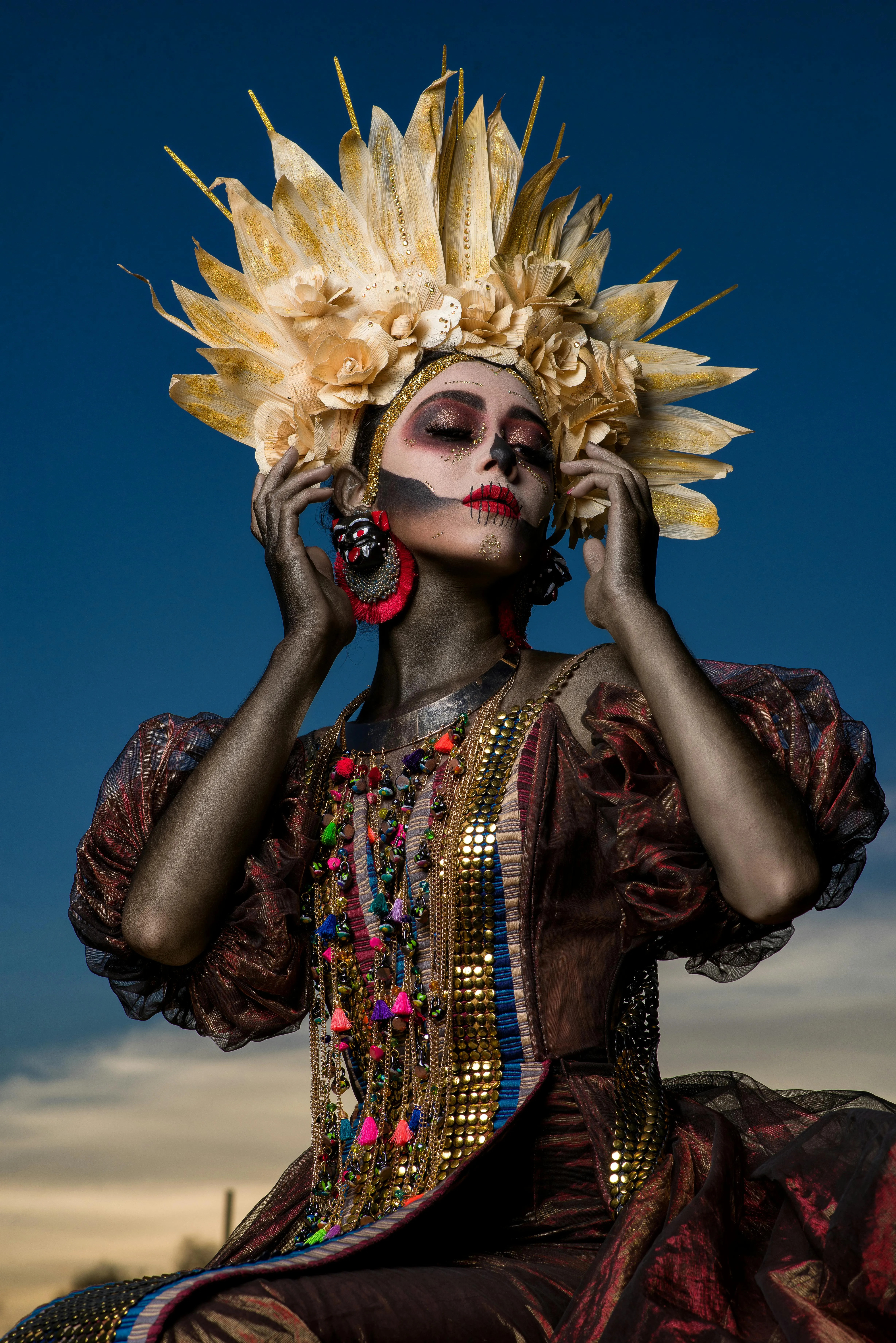Artistic Festival Costume with Sunflower Headpiece Wallpaper
