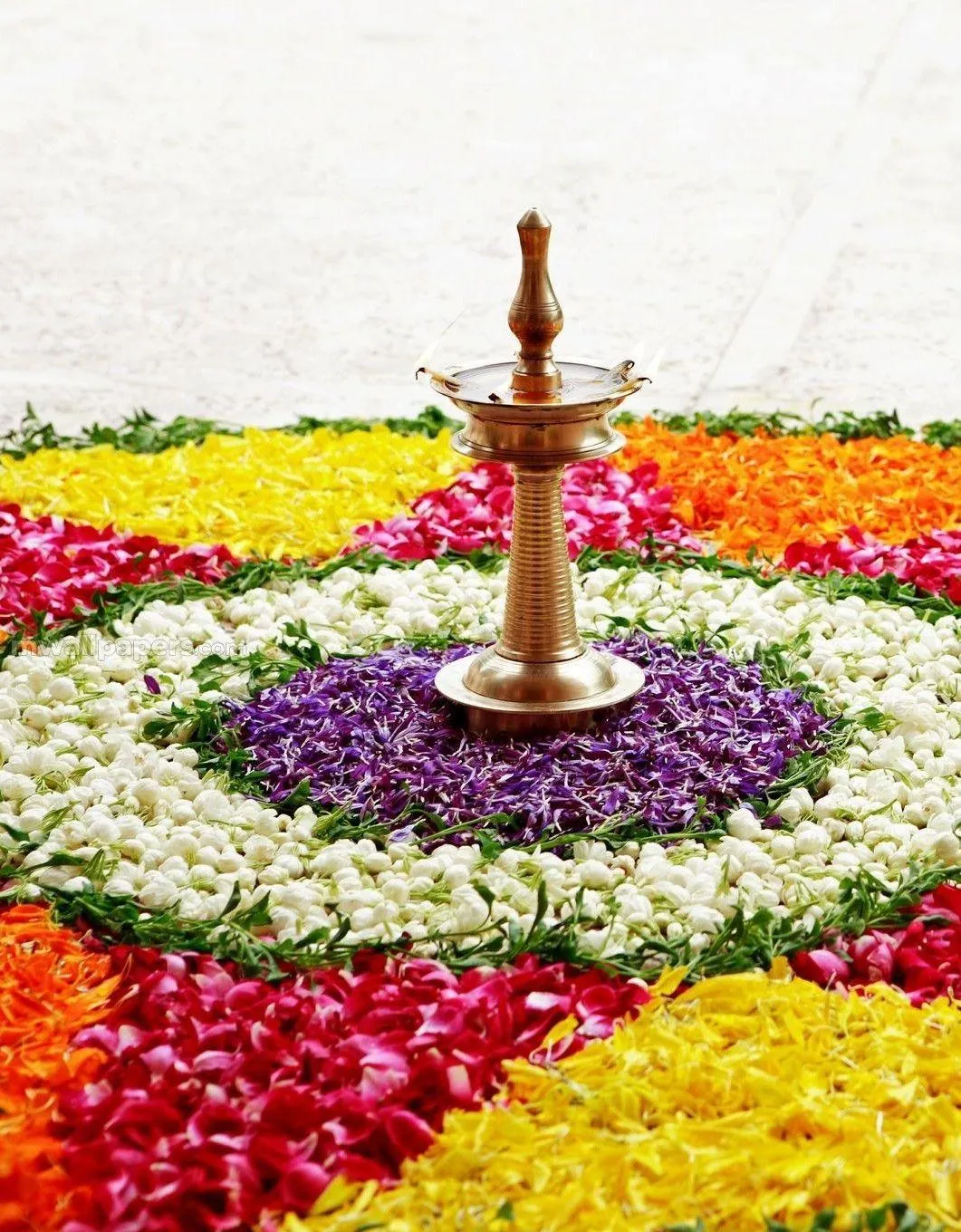 Athapookolam design with one lamp design kolam wallpaper