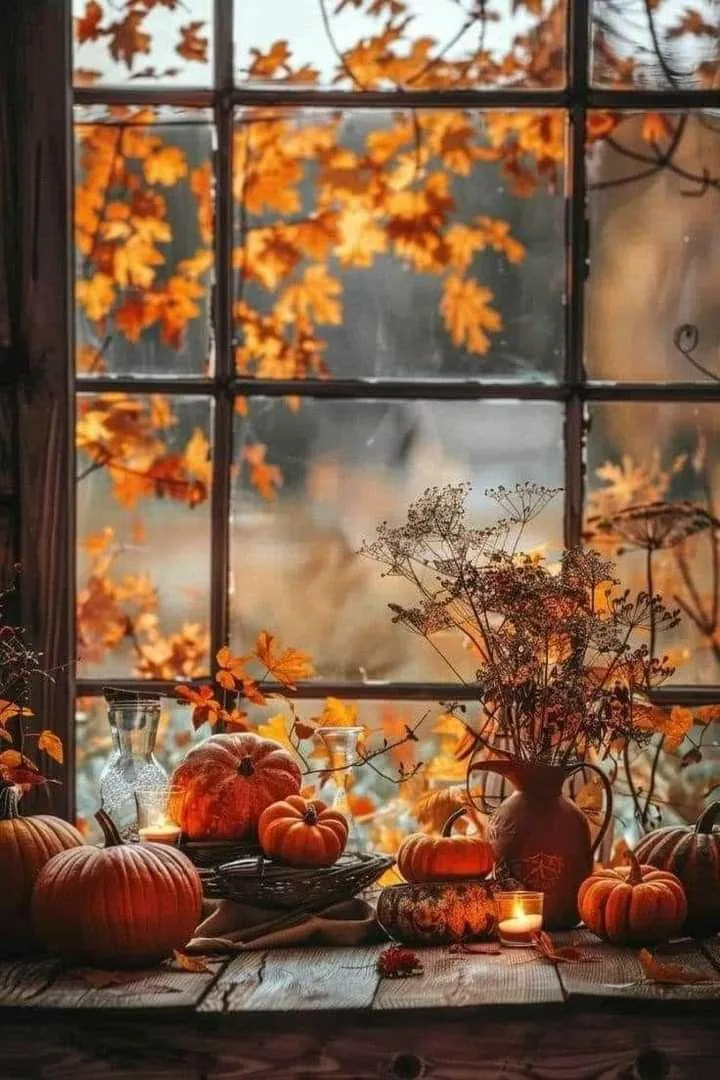 Autumn Window Scene with Pumpkins and Colorful Leaves