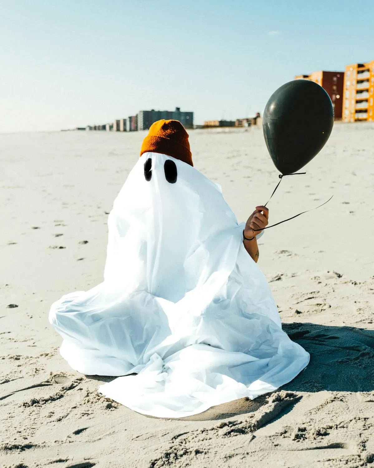Beach Ghost Costume Holding a Balloon on Halloween HD
