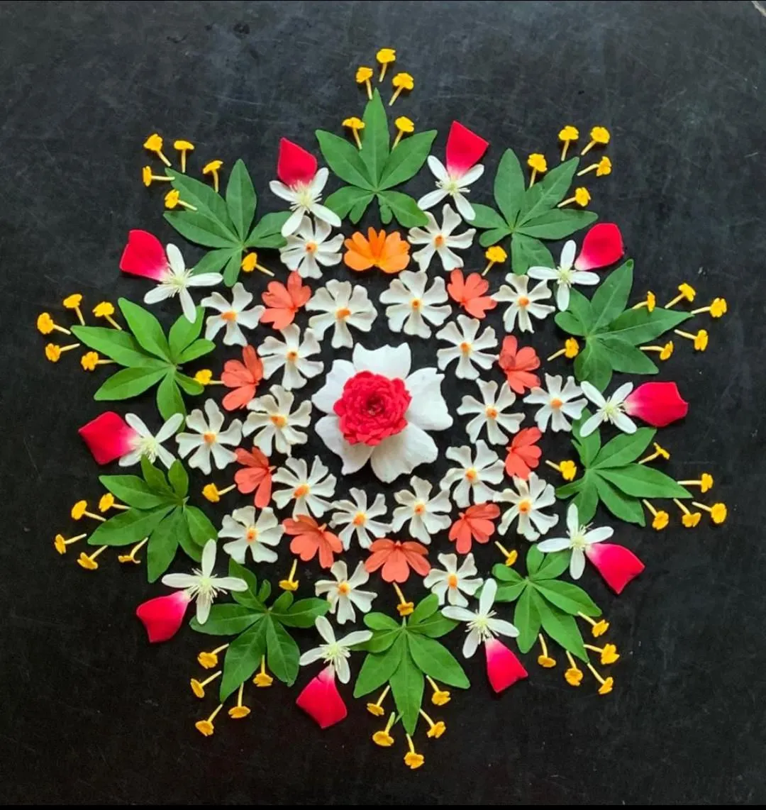 Beautiful blooming white flower kolam with leaves image