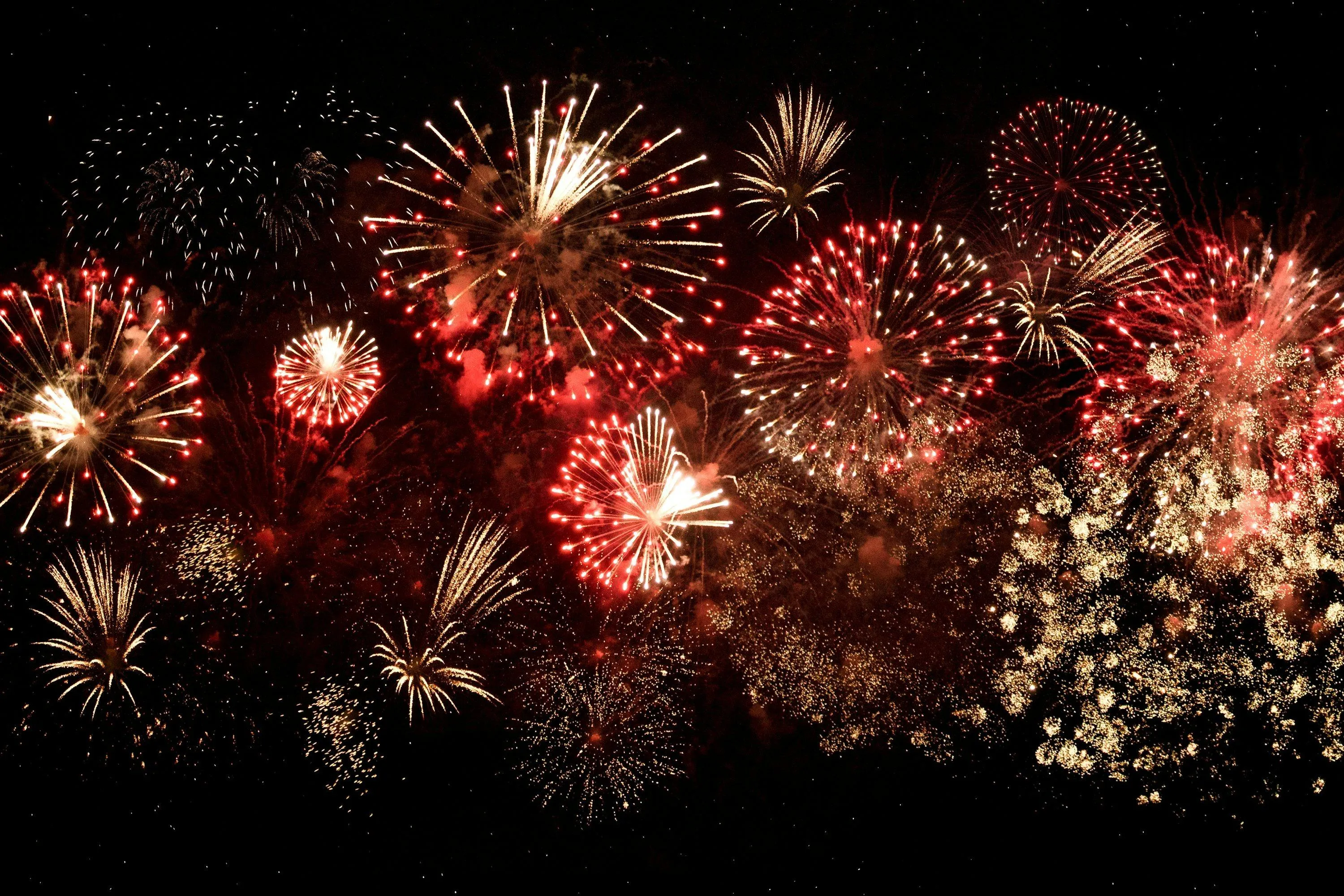 Beautiful bright fireworks lighting up the night sky
