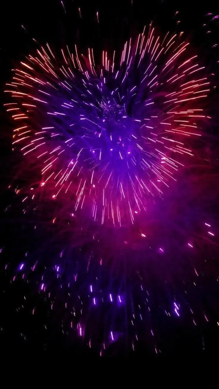 Beautiful Heart Shaped Fireworks in Purple and Blue Hues