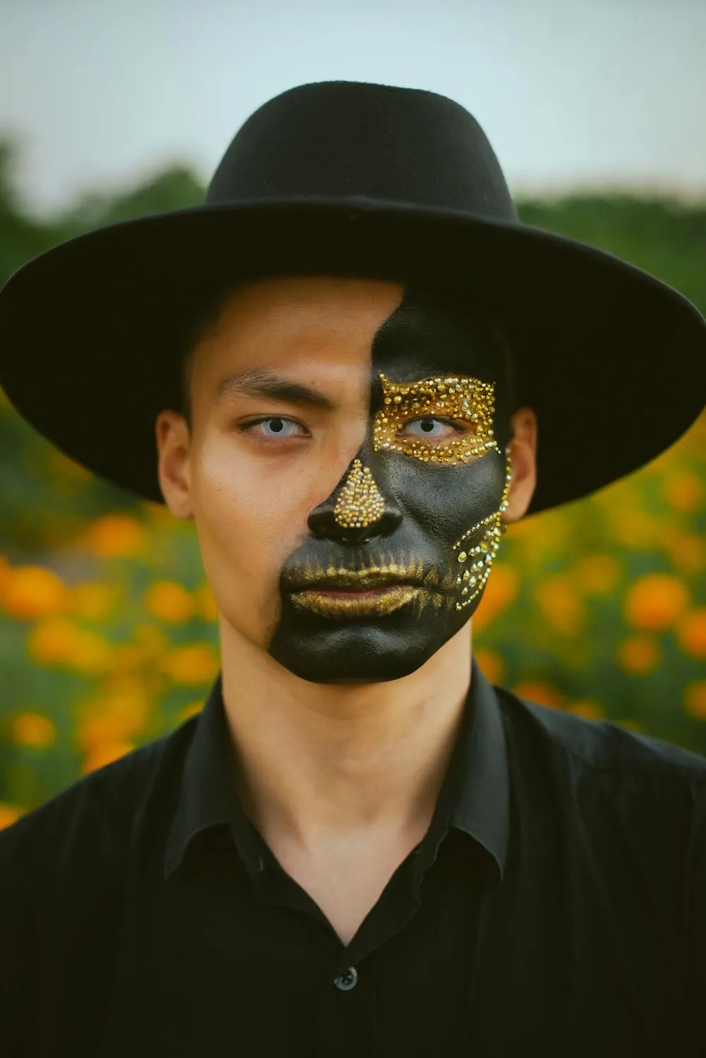 Black and Gold Skull Makeup with Floral Background