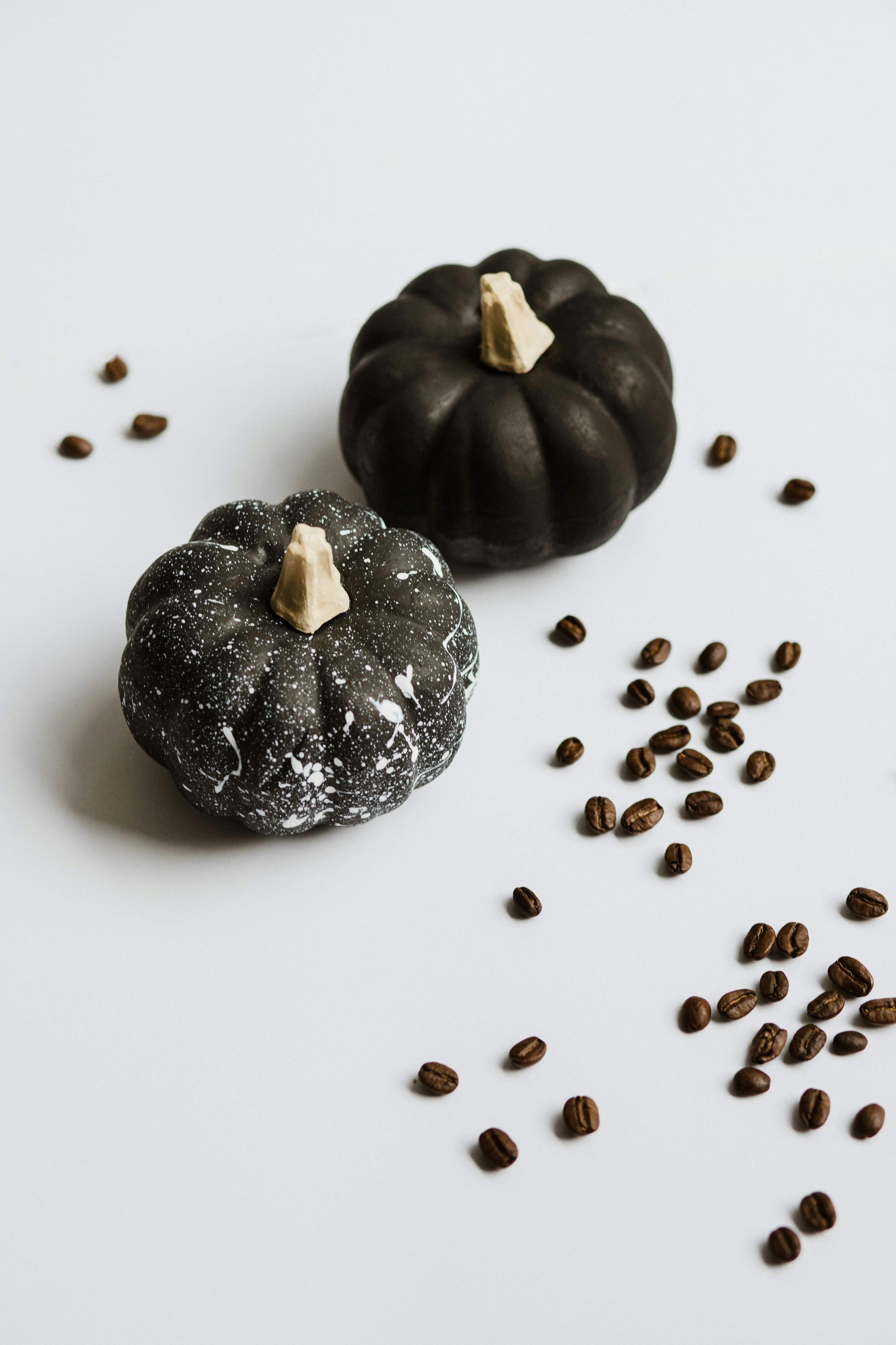 Black and Silver Pumpkins with Coffee Bean Decor Wallpaper