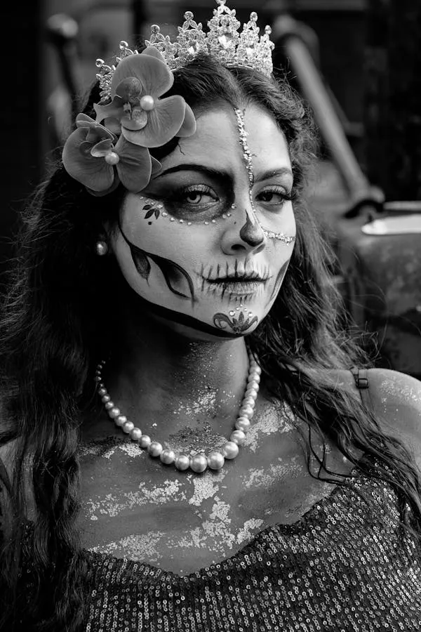 Black and White Portrait of Woman with Half Skull Face Paint