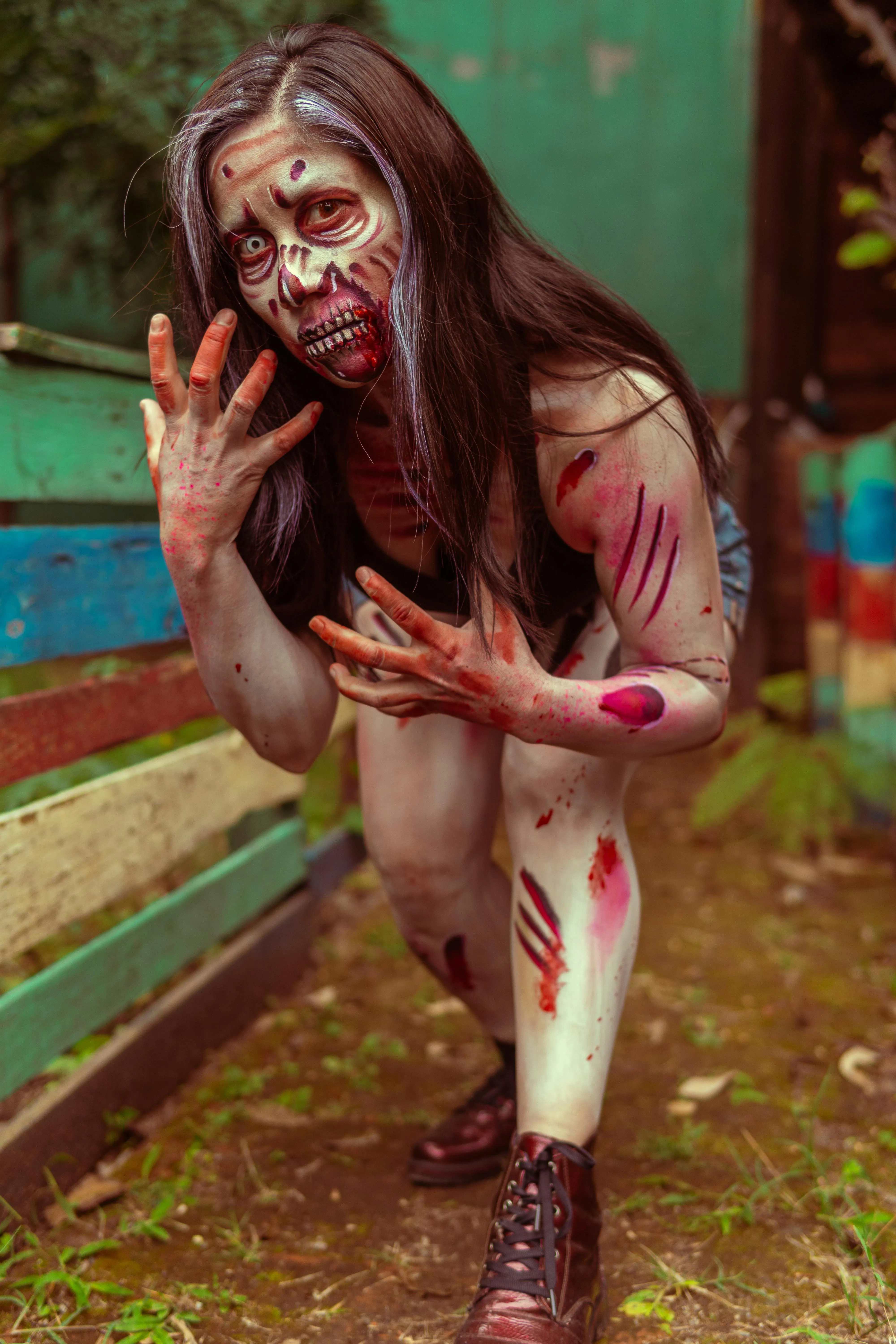 Bloodied Woman in Creepy Halloween Zombie Makeup Wallpaper