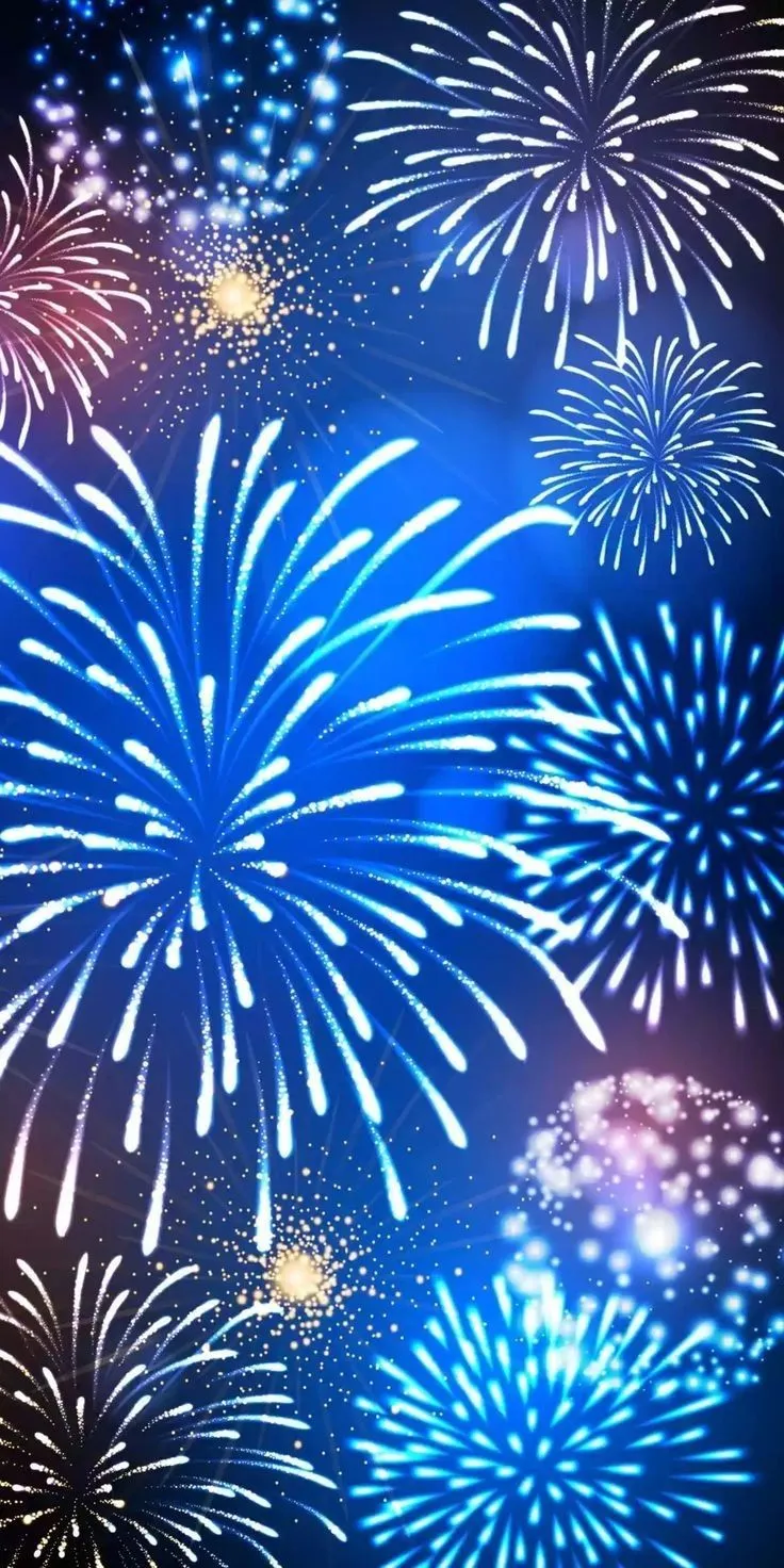 Blue and multicolored fireworks against the dark sky