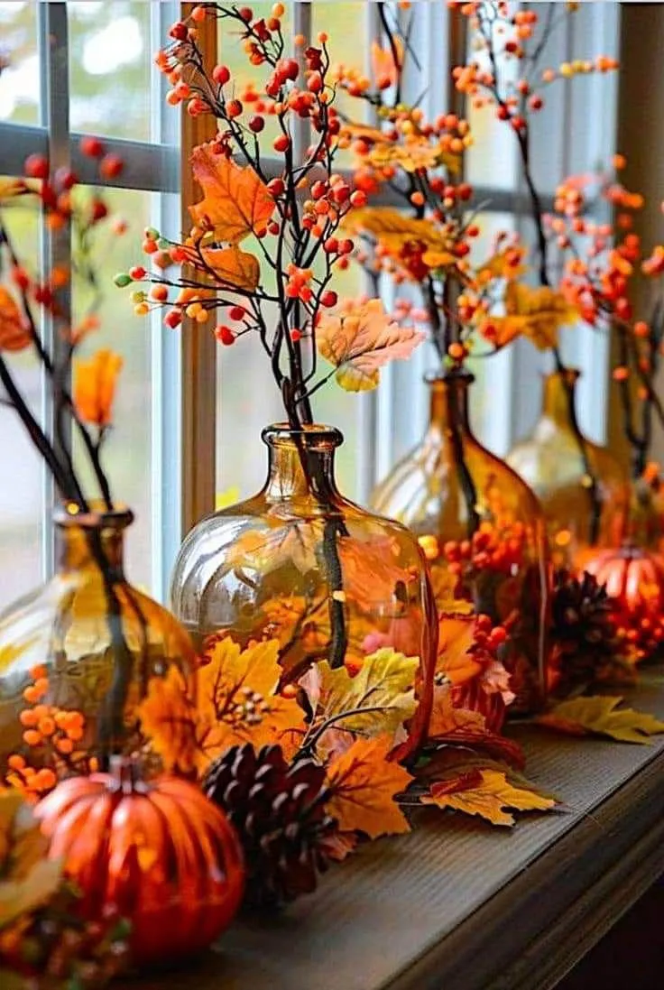 Bright Autumn Window Display with Pumpkins and Leaves
