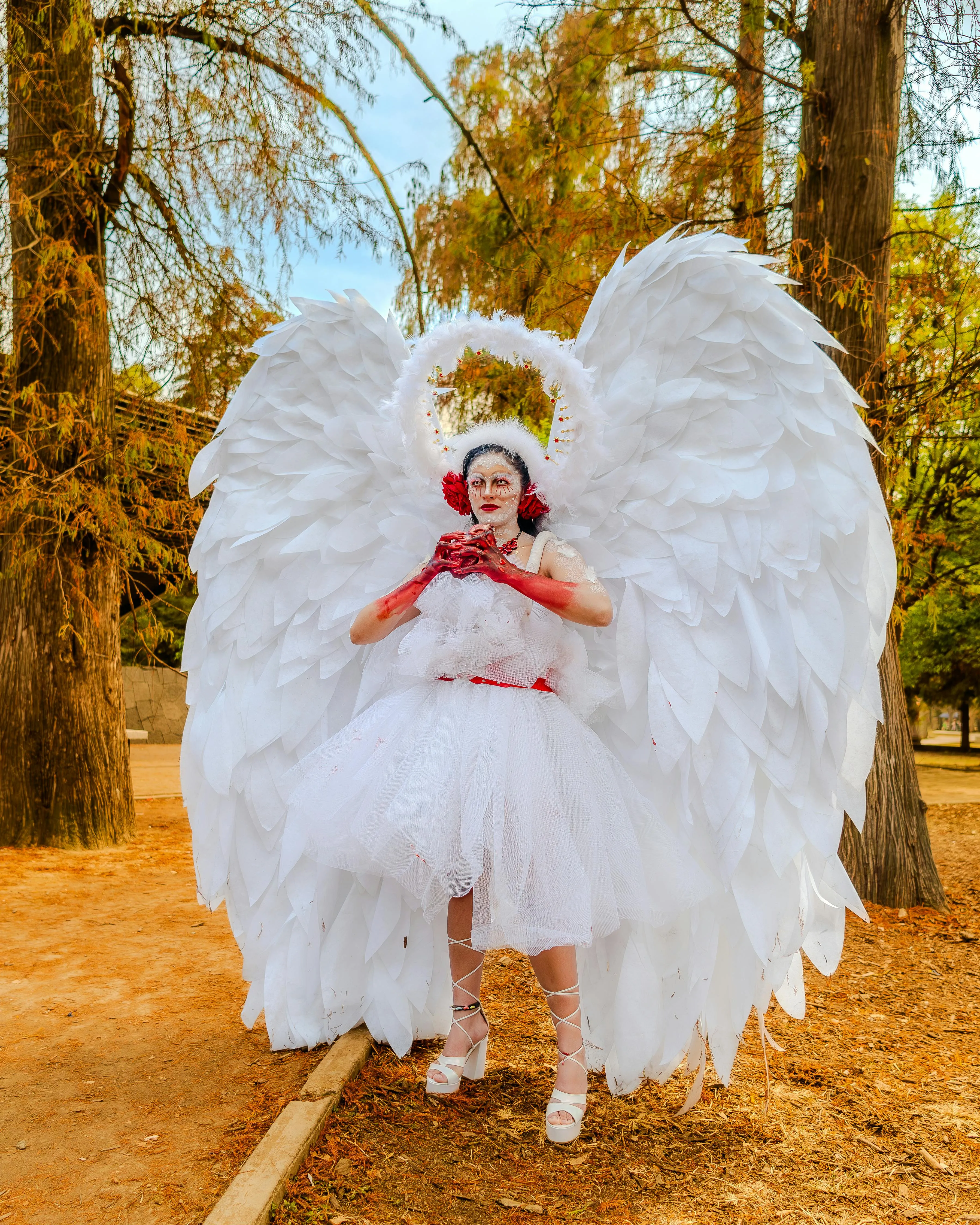 Child Dressed as Angel with Large White Wings Costume