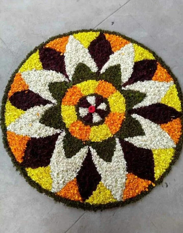 Circular layered flower design pookolam for Onam festival