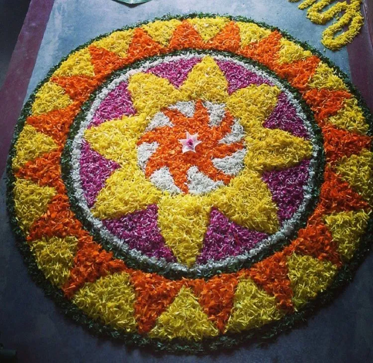 Circular swirling pattern Athapookolam for Onam festival