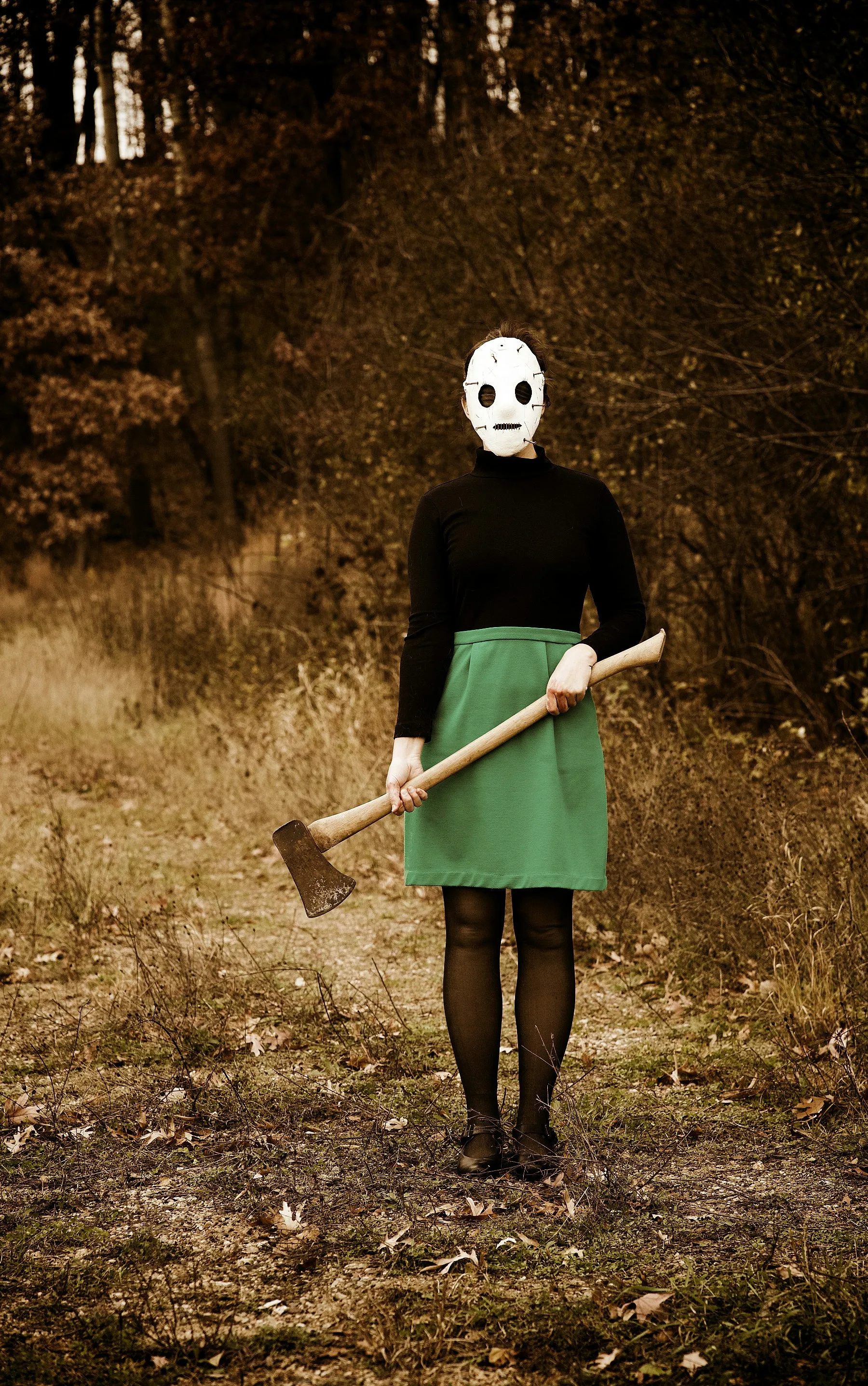 Classic Halloween Festival Costume with Axe Prop Wallpaper