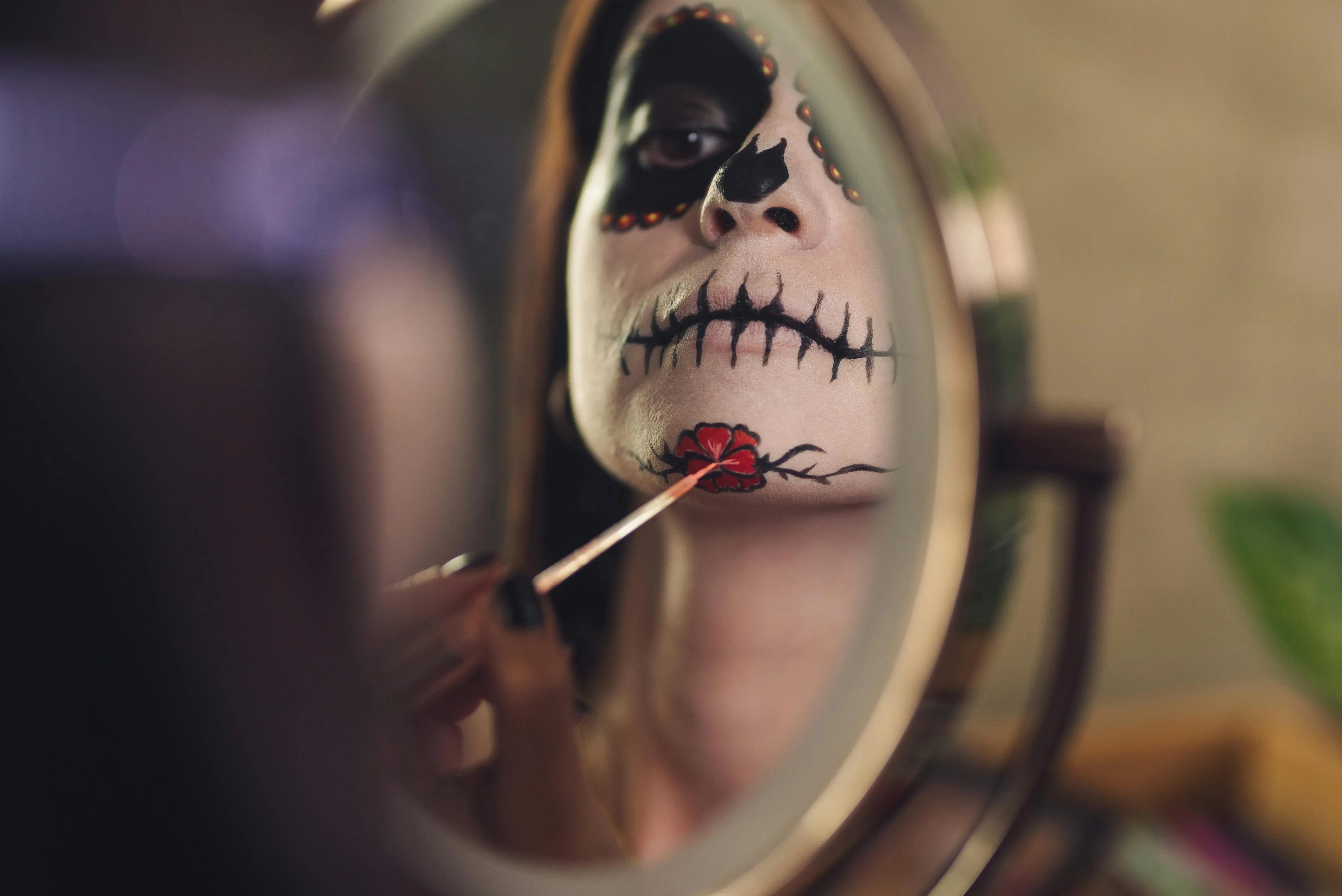 Close Up of Sugar Skull Face Painting in Mirror Reflection