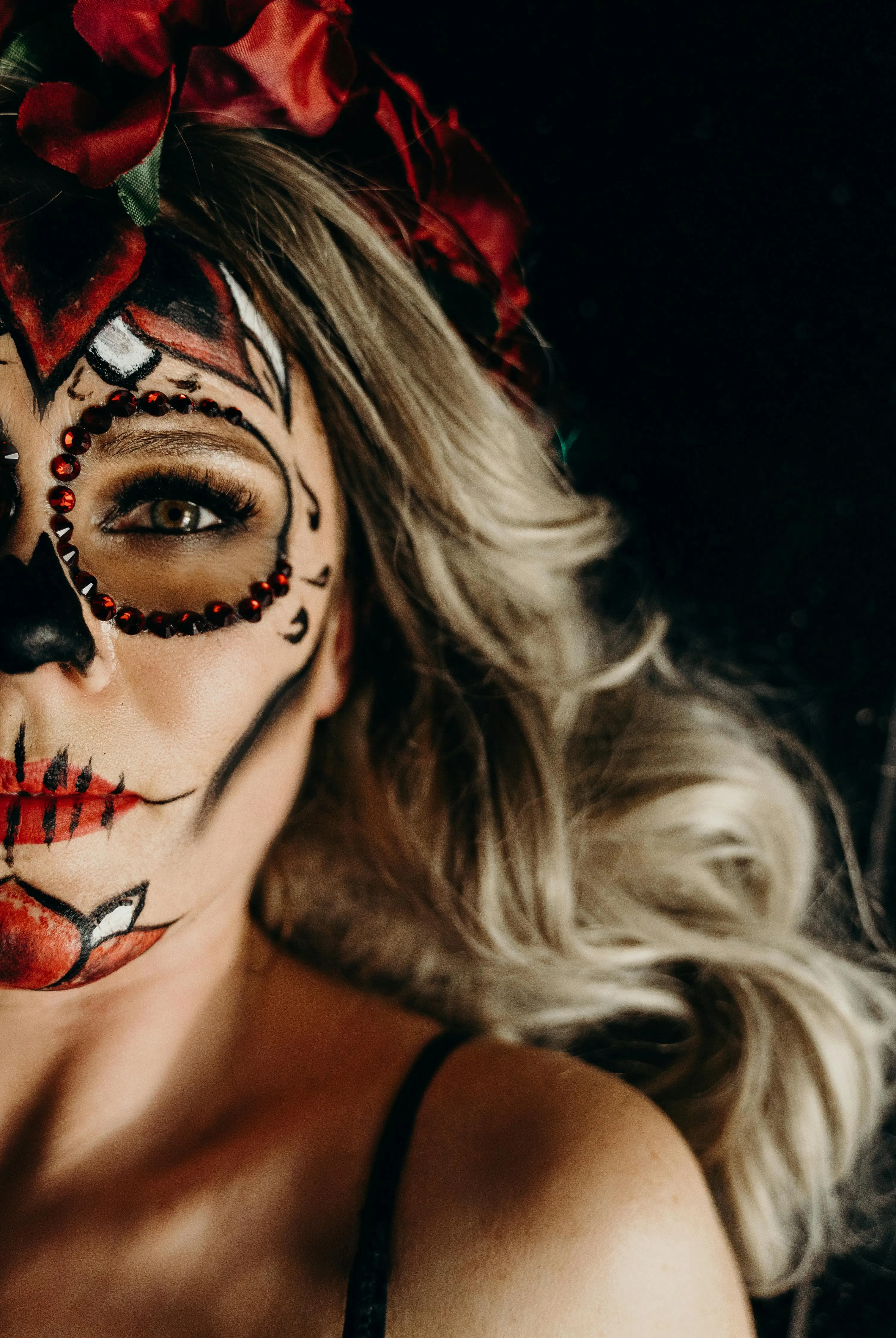 Close Up of Women in Halloween Makeup with Skull Design