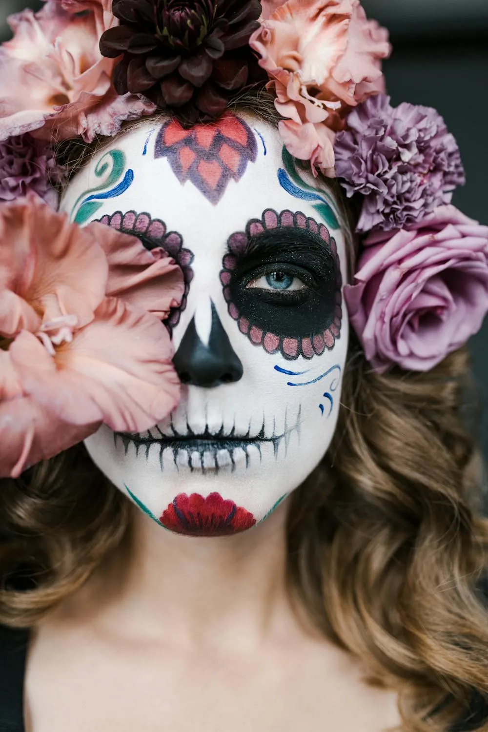 Close Up of Women in Sugar Skull Makeup with Pink Flowers