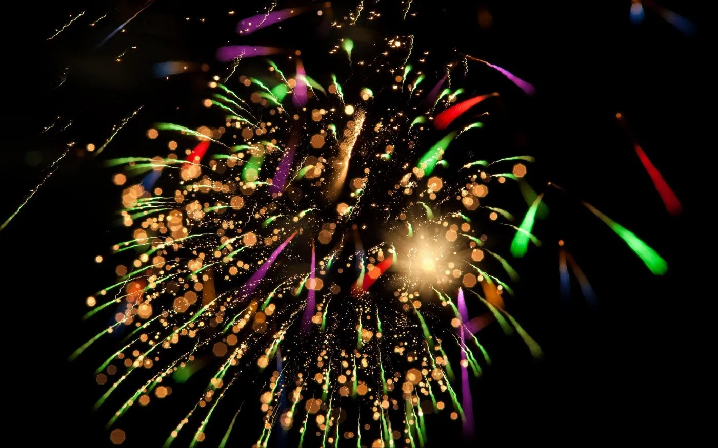 Close up shot of colorful fireworks exploding Wallpaper