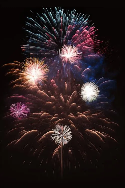 Colorful Firework Explosions Against Dark Background