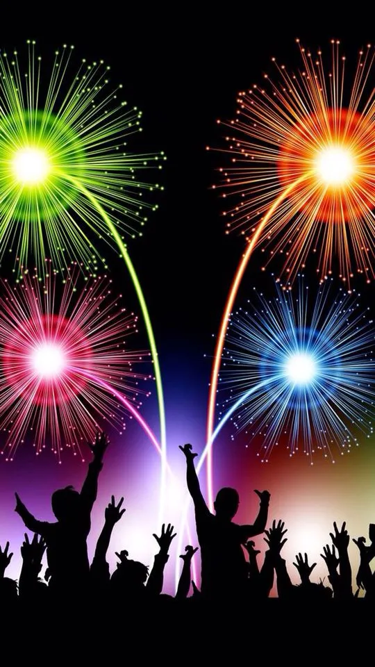 Colorful fireworks and a silhouette crowd celebration