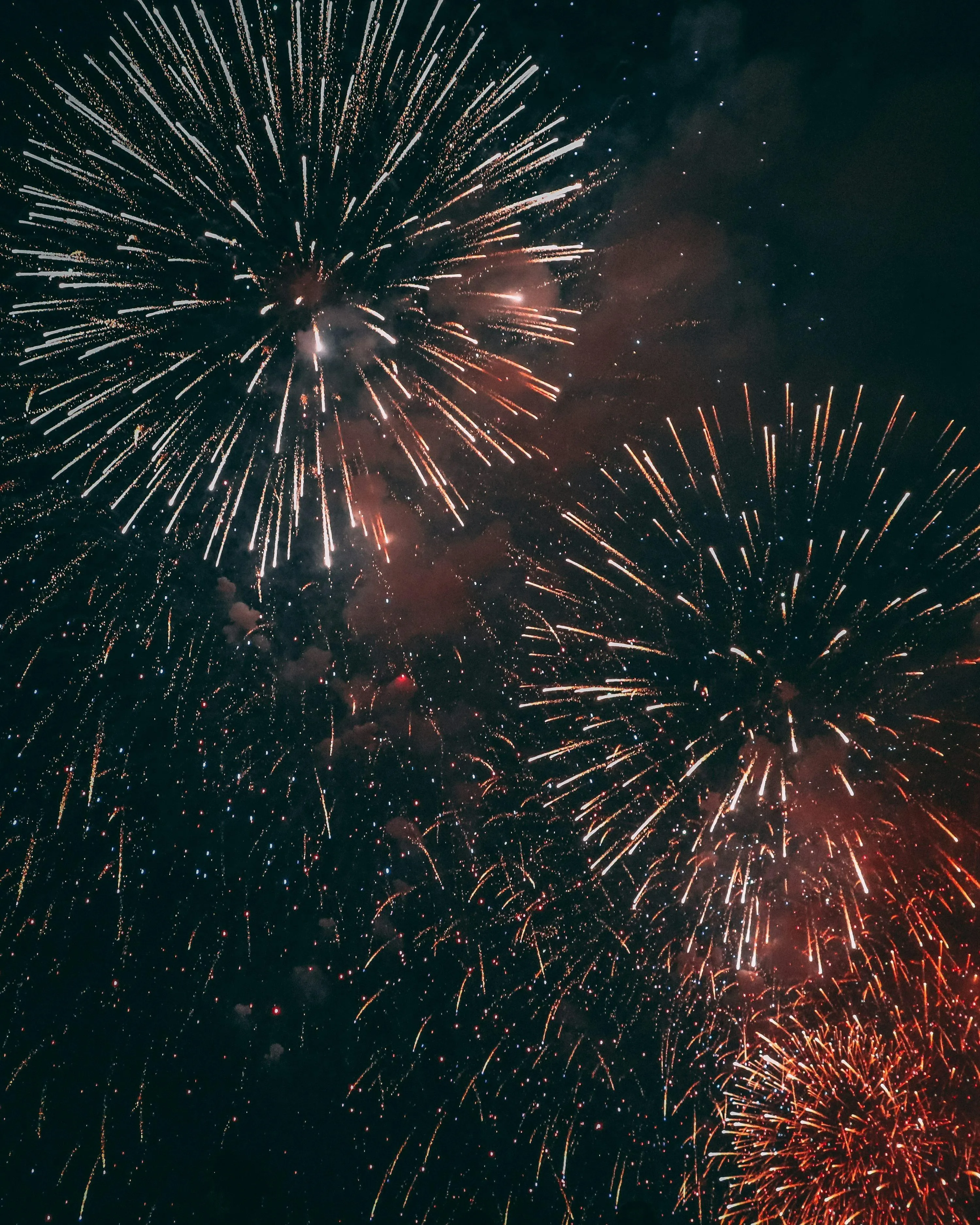 Colorful Fireworks Bursting in the Dark Sky free 4K image