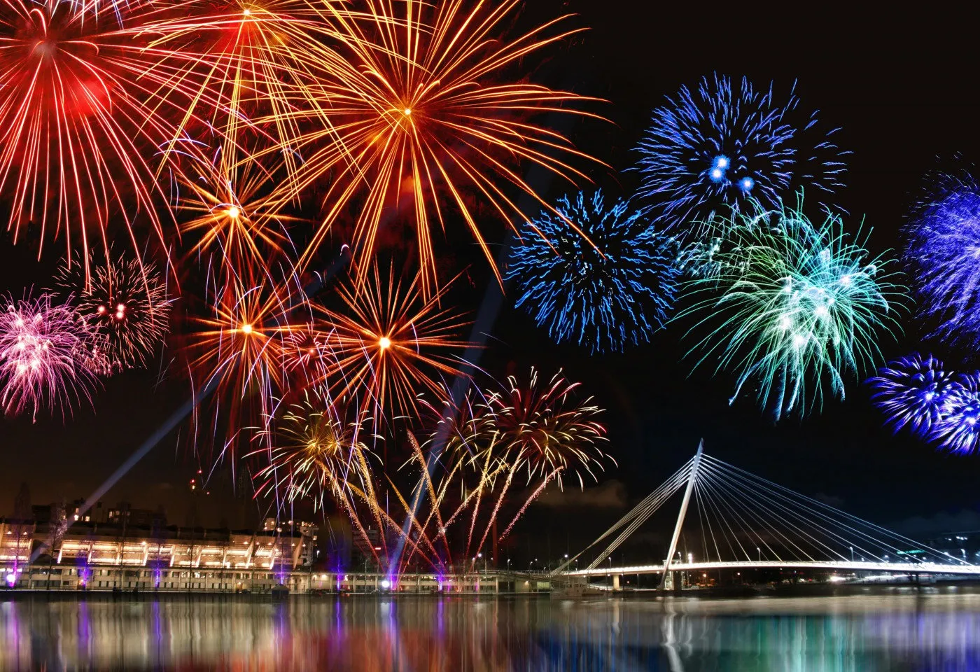 Colorful Fireworks Creating Beautiful Patterns over the Water
