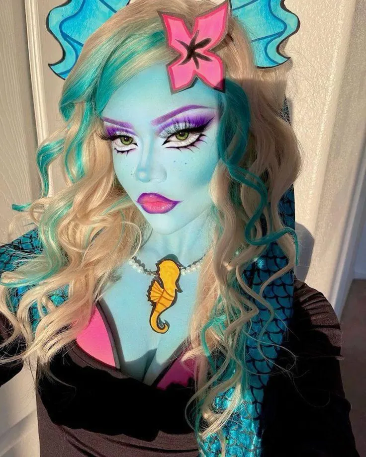 Colorful Halloween Makeup and Costume with Blue Hair