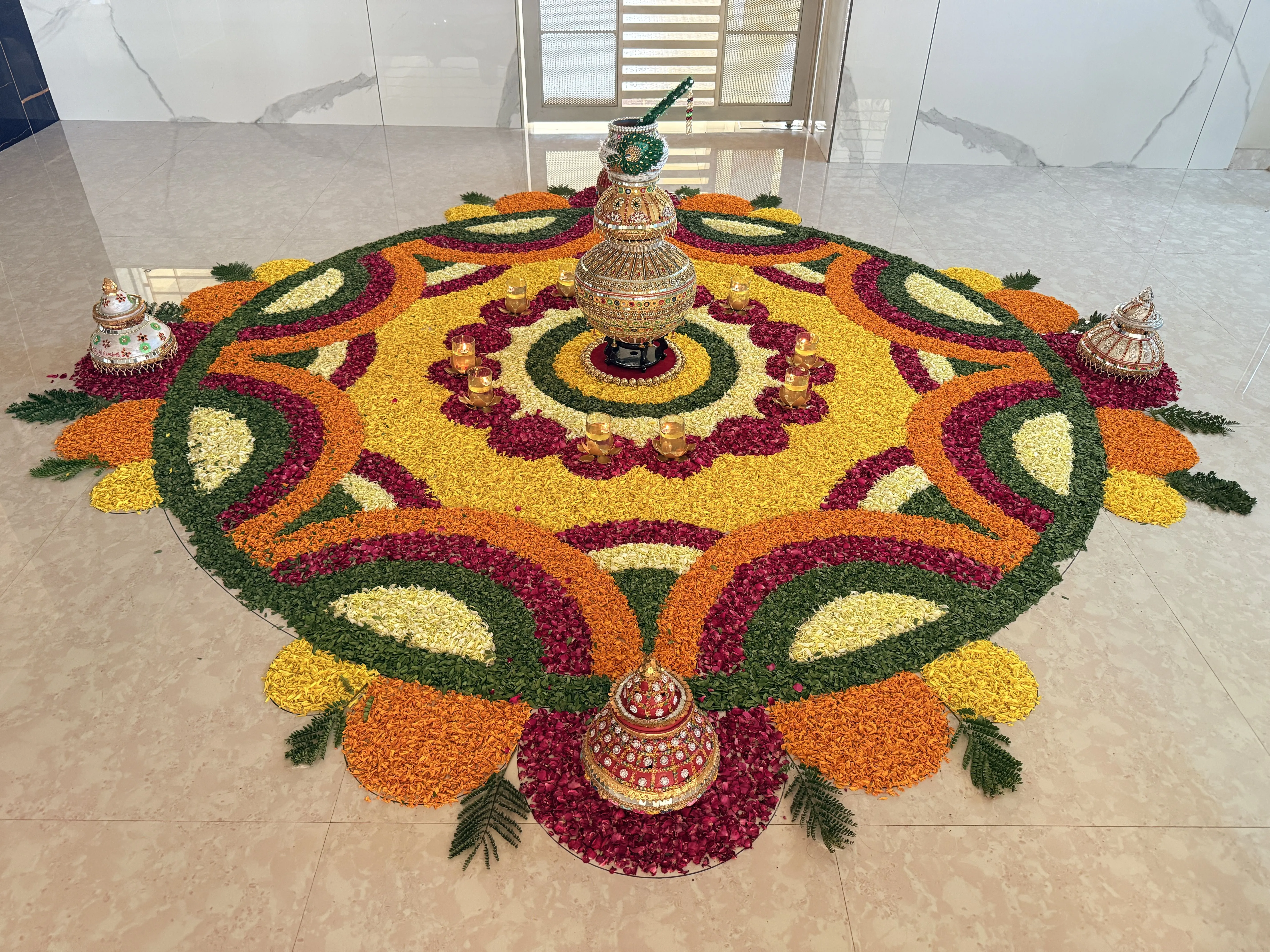 Colourful big Athapookolam with decorative pot details