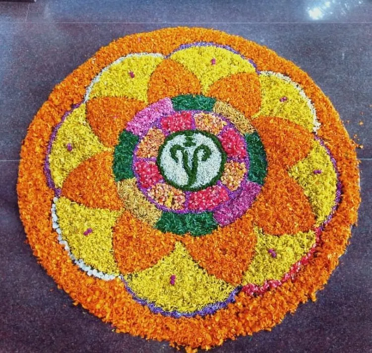 Colourful Ganesha Pookalam design for Onam Celebration