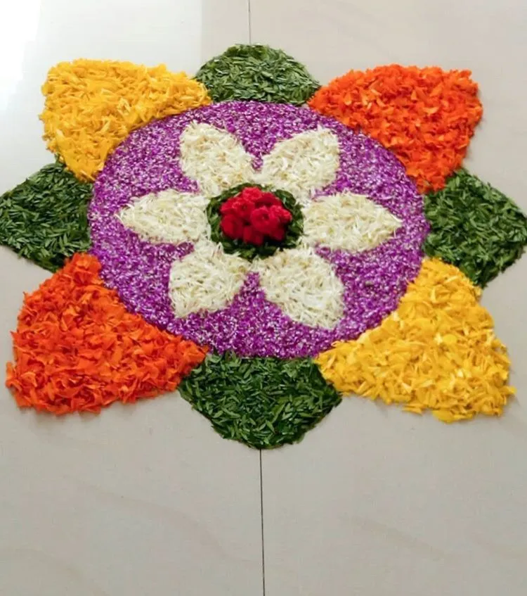 Colourful Onam pookolam design with flower art free image