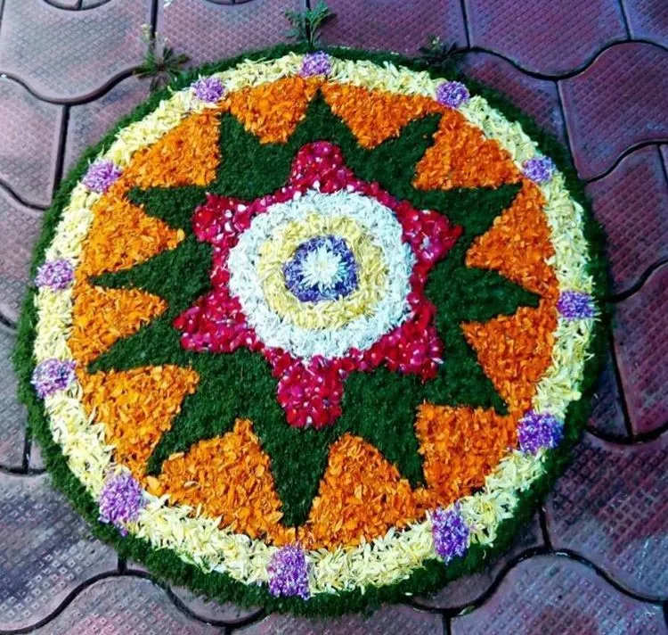 Colourful Onam Pookolam with vibrant colours HD wallpaper