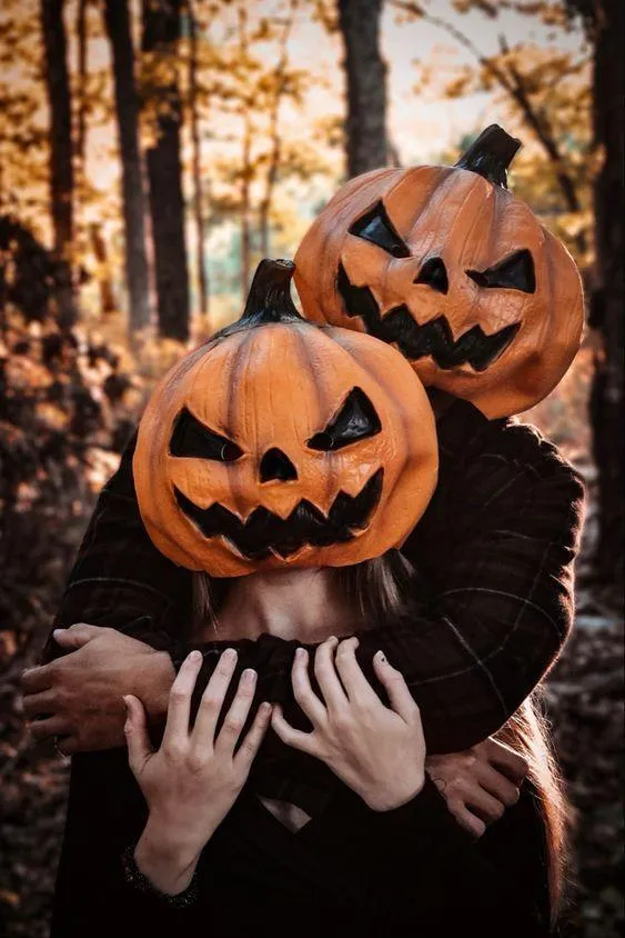 Couple in Pumpkin Heads in Autumn Woods Halloween Photo