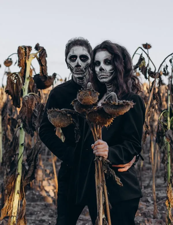 Couple in Skeleton Costumes in a Cornfield Wallpaper