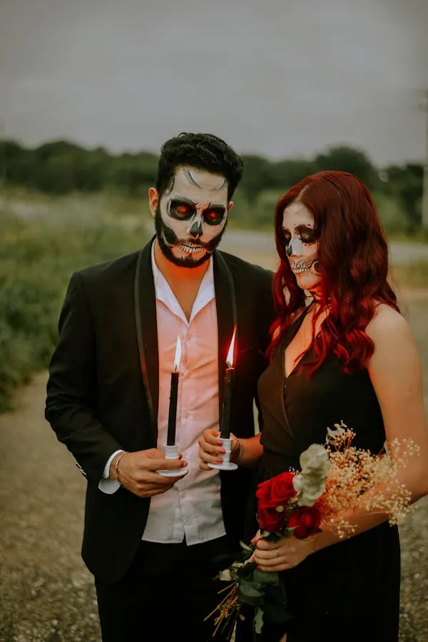 Couple in wedding costumes holding candles image HD