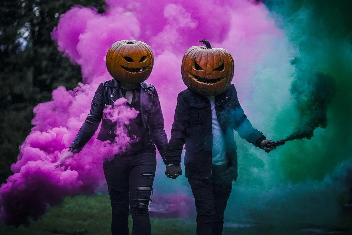 Couple with Pumpkin Heads and Color Smoke Effects Wallpaper