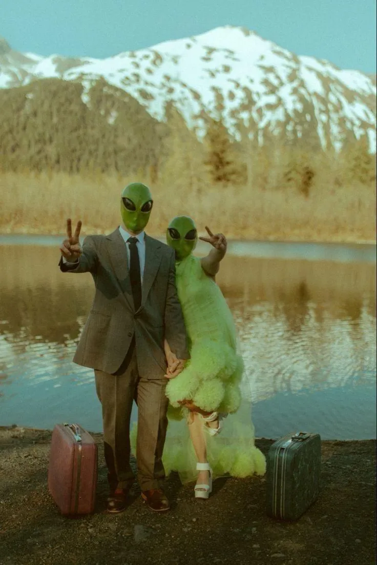 Couples Standing near the Water Wearing Halloween Costumes