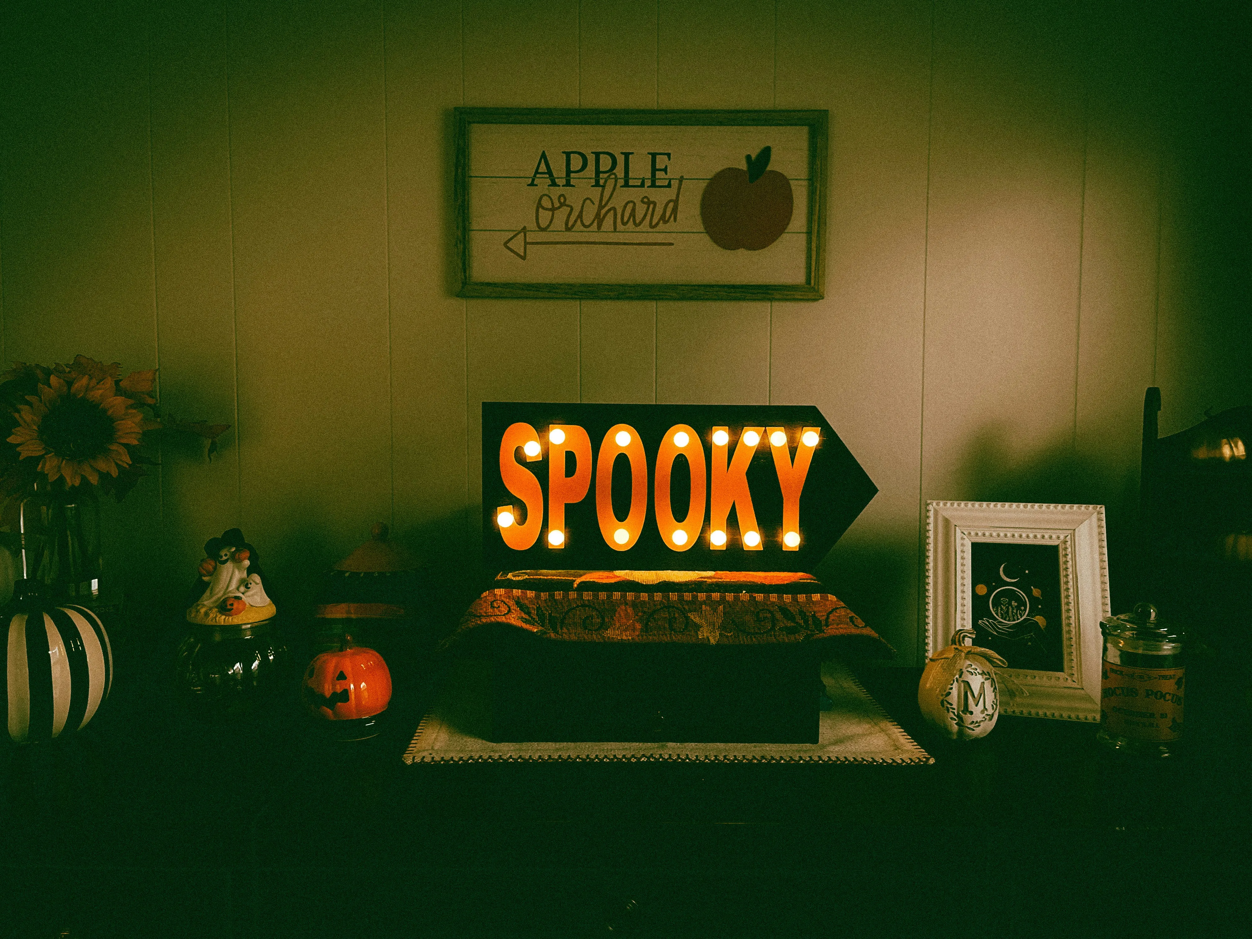 Cozy Halloween Living Room Decor with Spooky Vibes Wallpaper