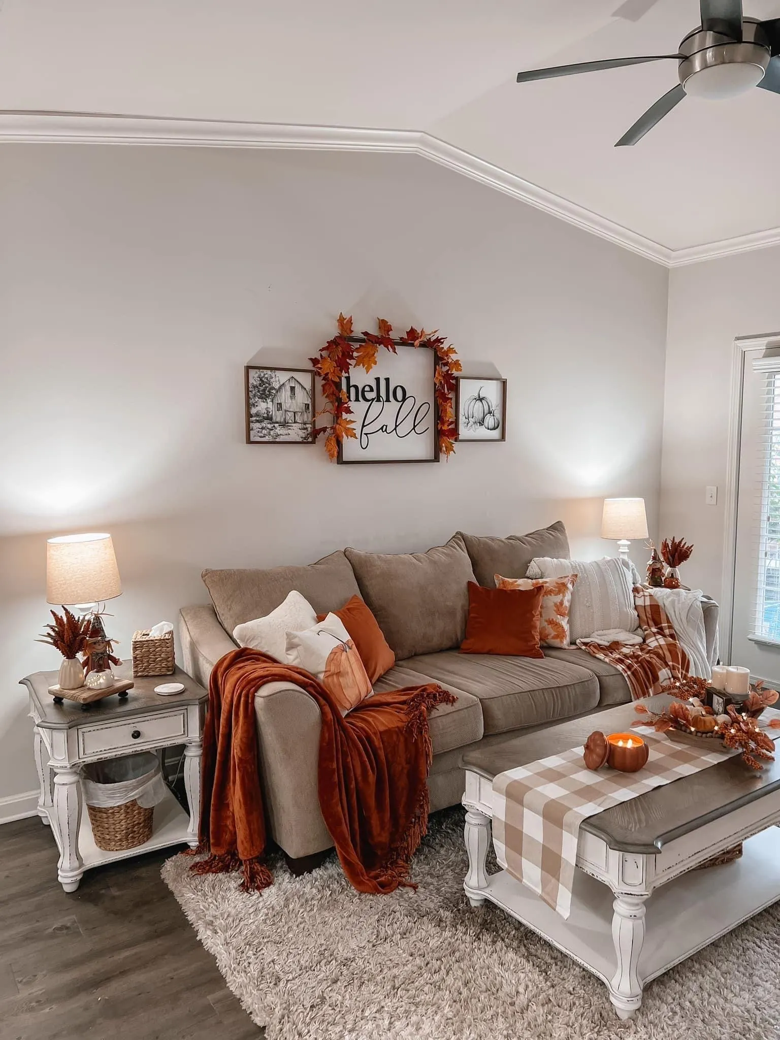 Cozy Living Room Decorated with White and Orange Pumpkins