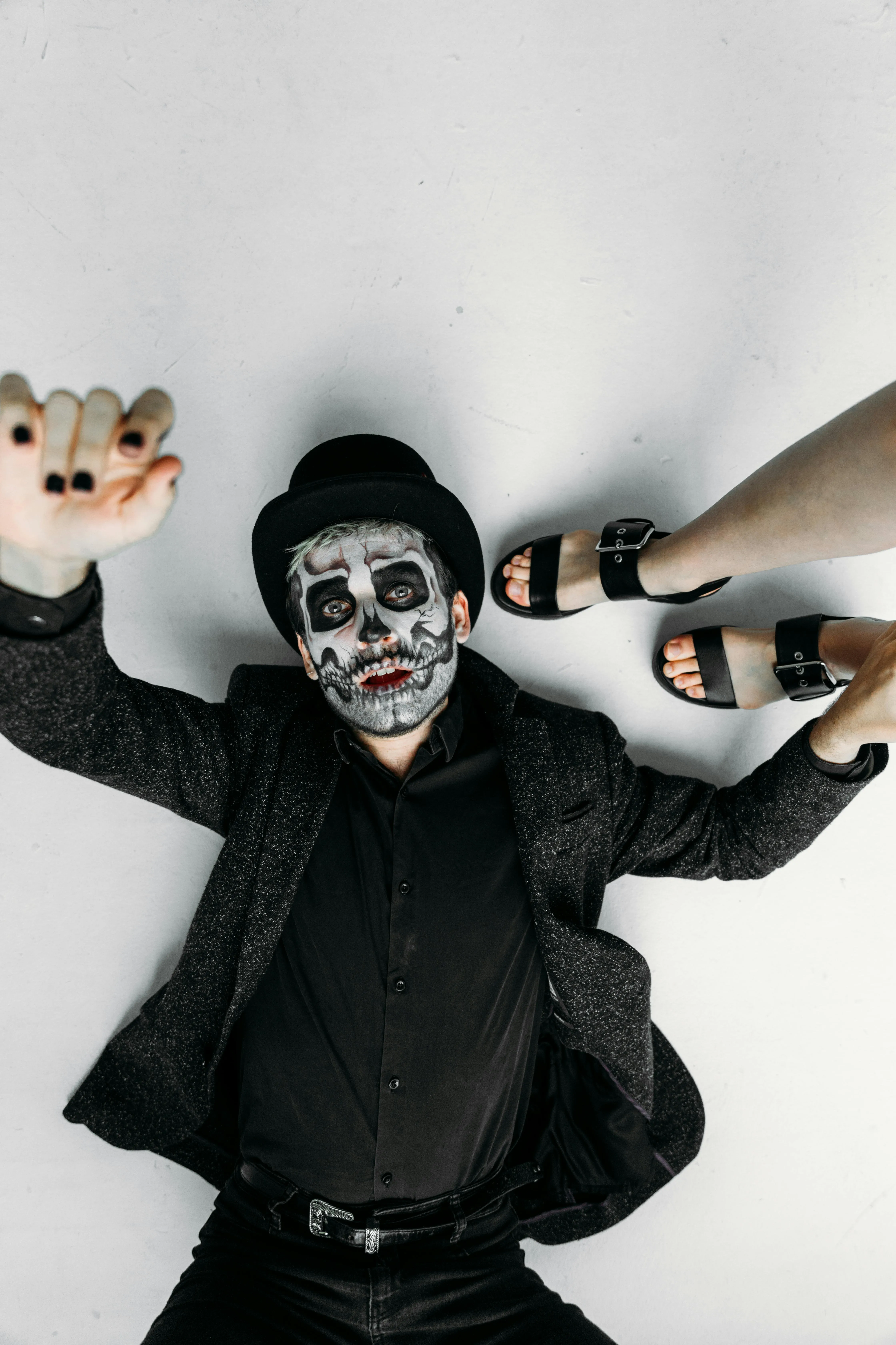Creepy Man lying down Performing Halloween Prank image