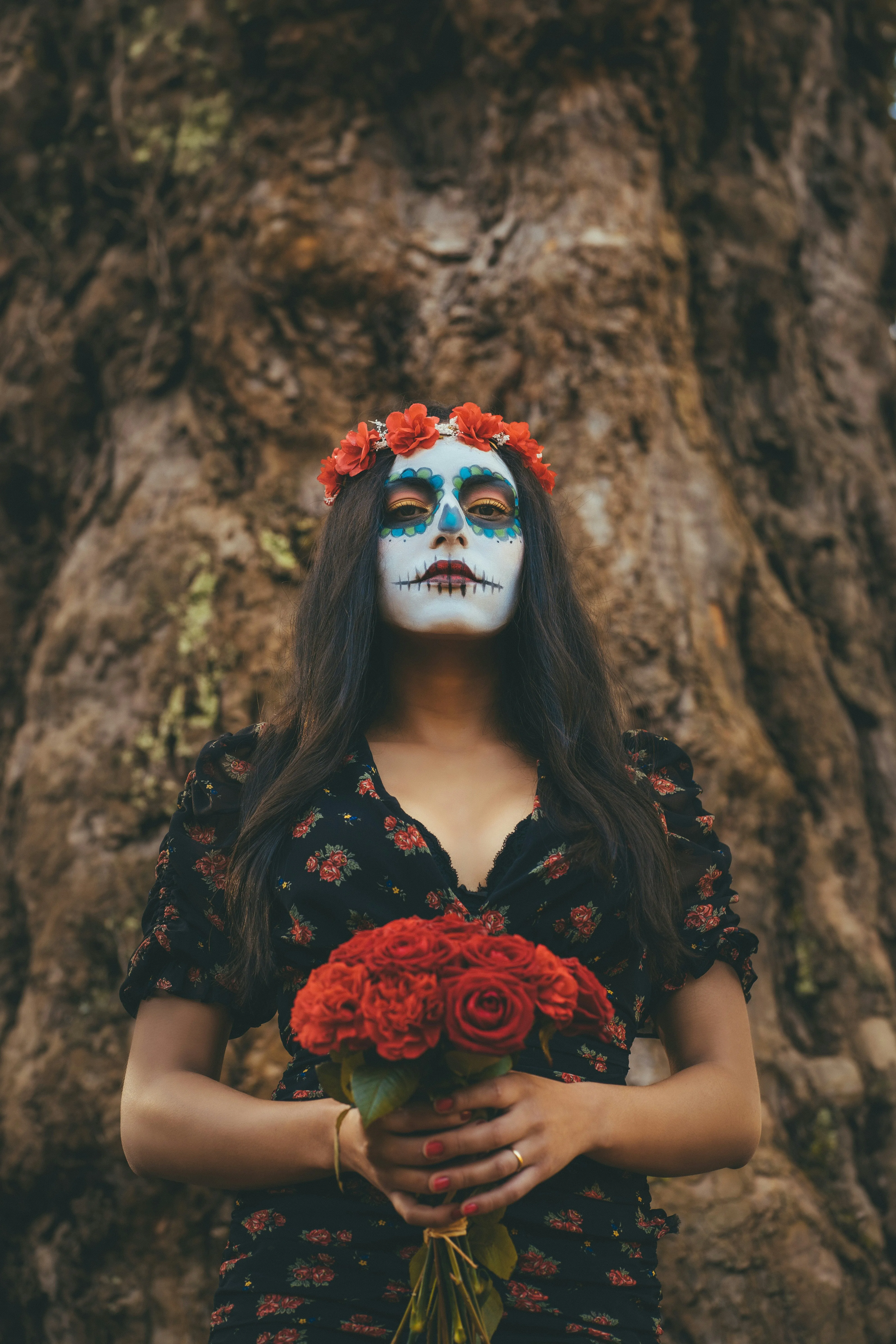 Day of the Dead Inspired Festival Makeup with tree background