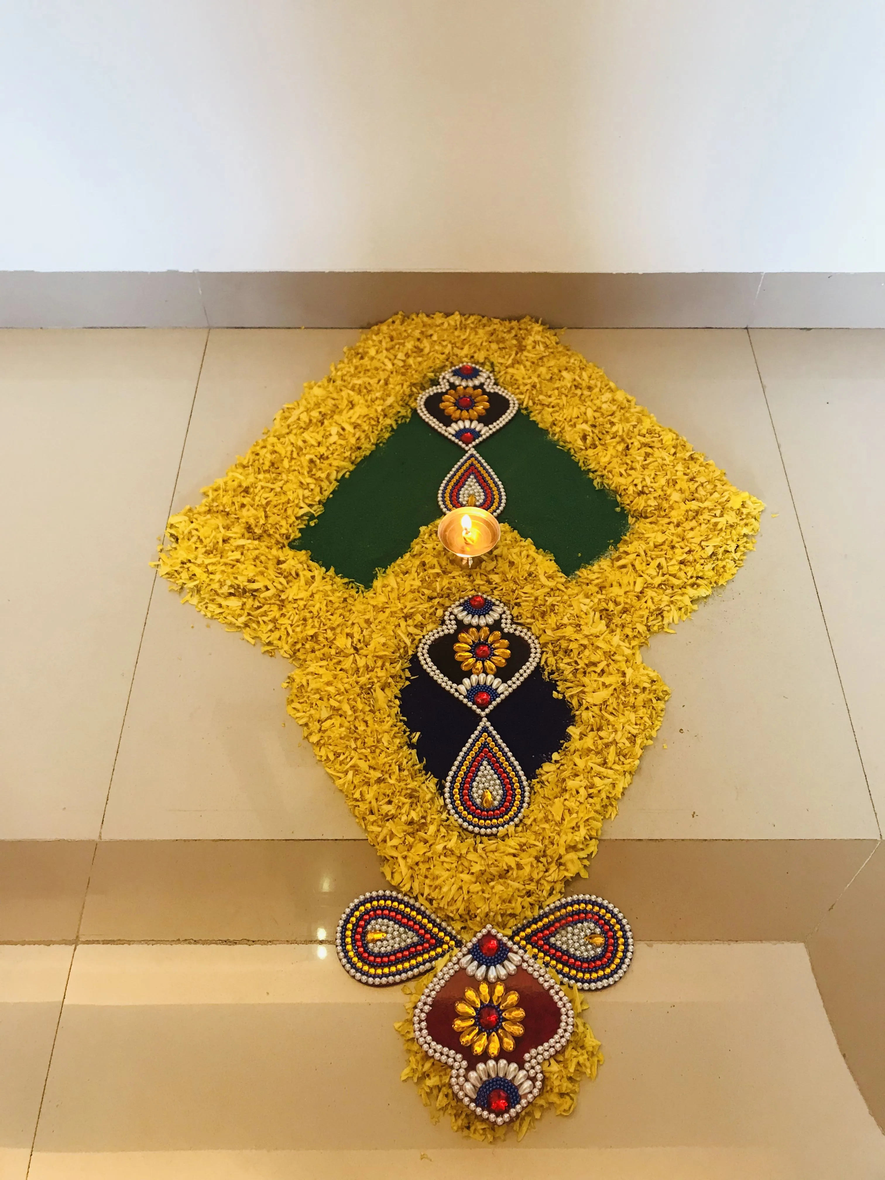 Diamond floral decorative pookolam with colourful beads